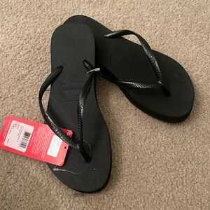 Brand new Black Havianas platform flip flops